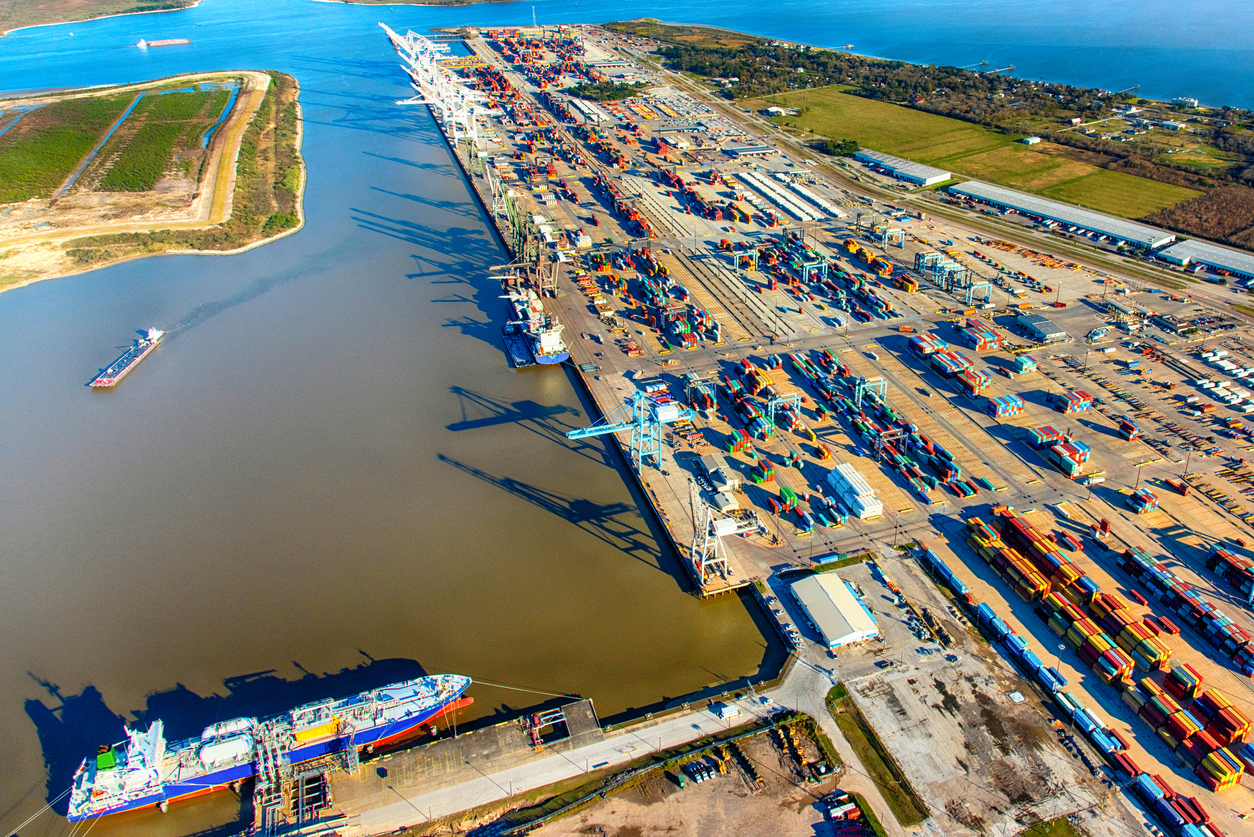 Aerial view of the Port of Houston, Texas captured from a helicopter at an altitude of 2000 feet, showcasing the bustling maritime activity and the importance of a reliable 3PL partner in logistics and shipping.